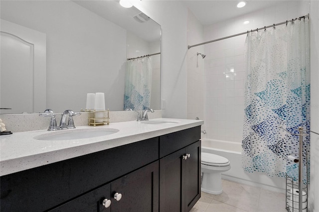 14214 Shocklach Dr, Winter Garden, FL 34787 - bathroom with toilet, tile patterned floors, a sink, and shower / bath combo with shower curtain