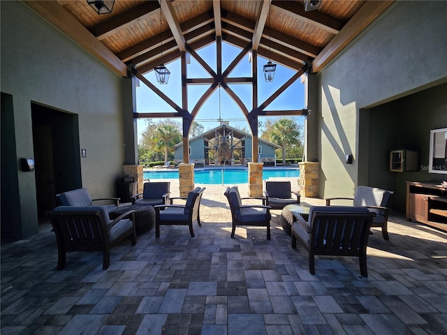 14214 Shocklach Dr, Winter Garden, FL 34787 - view of patio with an outdoor hangout area, a community pool, and a lanai