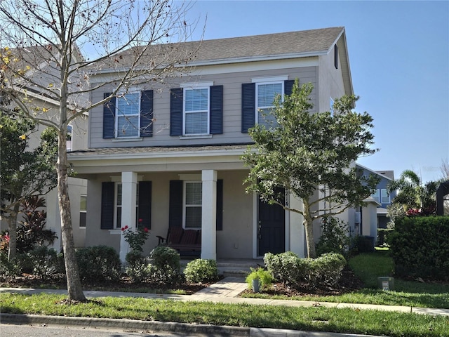 14214 Shocklach Dr, Winter Garden, FL 34787 - view of front of home with covered porch and roof with shingles