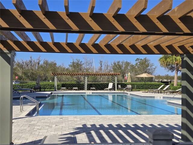 14214 Shocklach Dr, Winter Garden, FL 34787 - pool with a pergola and a patio area