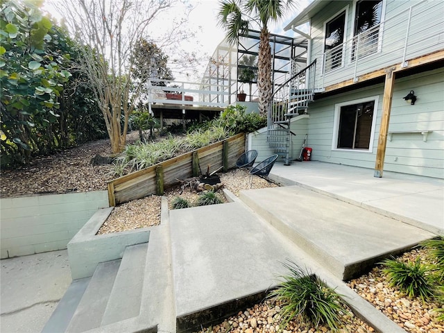 view of patio featuring stairway