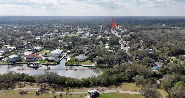 aerial view with a water view and a residential view