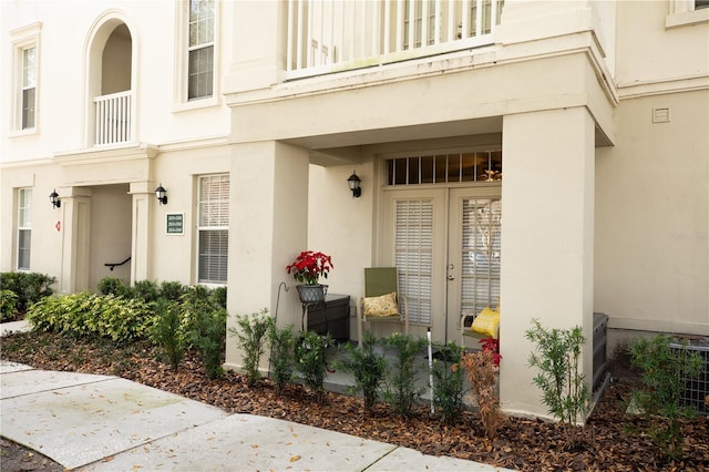 doorway to property featuring a balcony