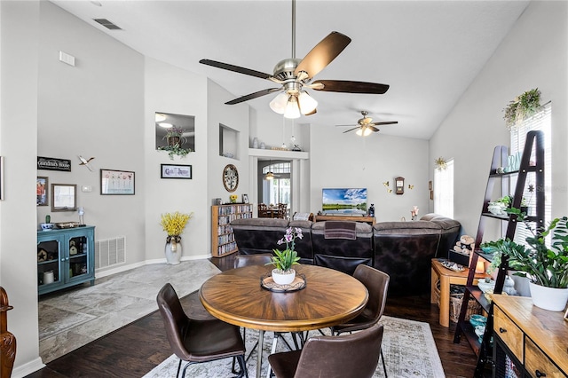 dining area with lofted ceiling