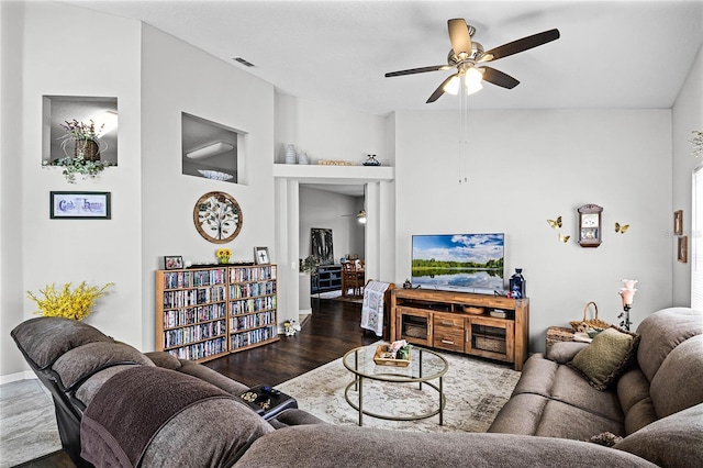 living room with ceiling fan and wood-type flooring