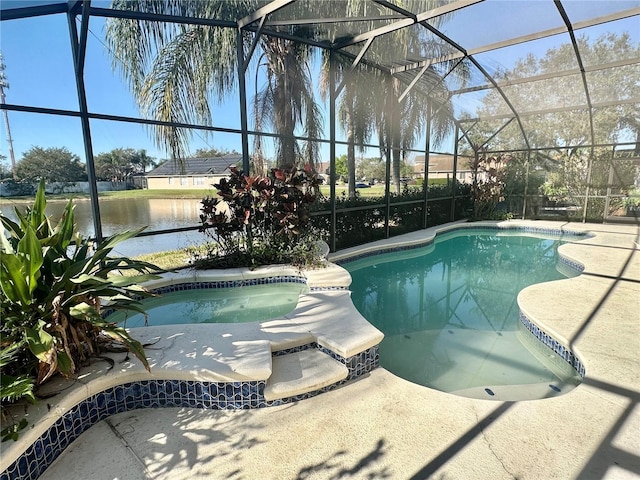 view of swimming pool featuring a patio, a water view, a lanai, and a pool with connected hot tub