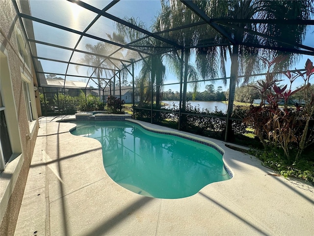 view of swimming pool with a water view, a pool with connected hot tub, a lanai, and a patio