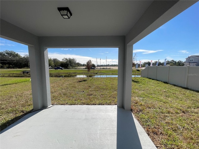 view of patio / terrace with a water view