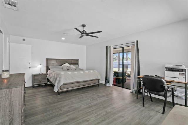 bedroom with a ceiling fan, dark wood finished floors, visible vents, and access to exterior