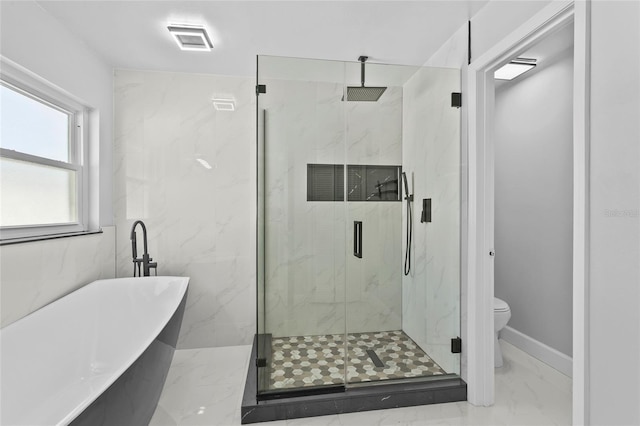 full bathroom with marble finish floor, a soaking tub, a marble finish shower, and toilet