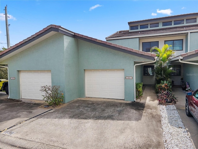 exterior space with a garage