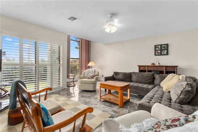 living room featuring a textured ceiling