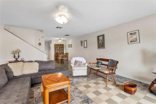 living room with ceiling fan