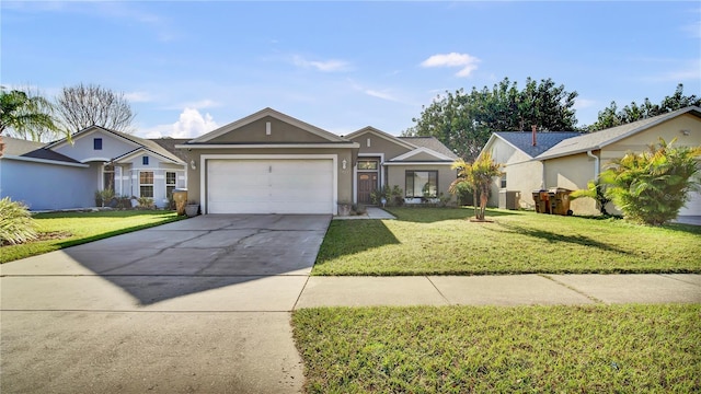 single story home featuring a garage and a front yard