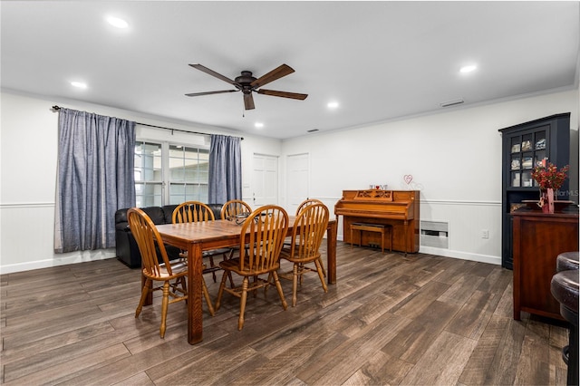 37224 Apiary Rd, Grand Island, FL 32735 - dining space with a ceiling fan, dark wood finished floors, a wainscoted wall, recessed lighting, and ornamental molding