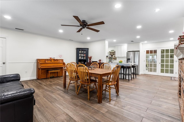 37224 Apiary Rd, Grand Island, FL 32735 - dining room featuring a ceiling fan, light wood finished floors, and recessed lighting