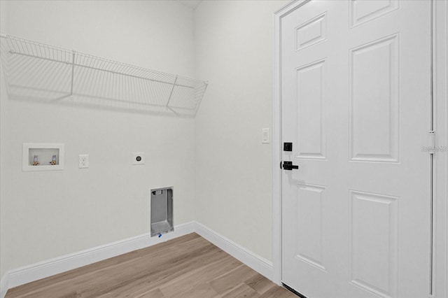 clothes washing area with washer hookup, light wood-style flooring, hookup for an electric dryer, laundry area, and baseboards