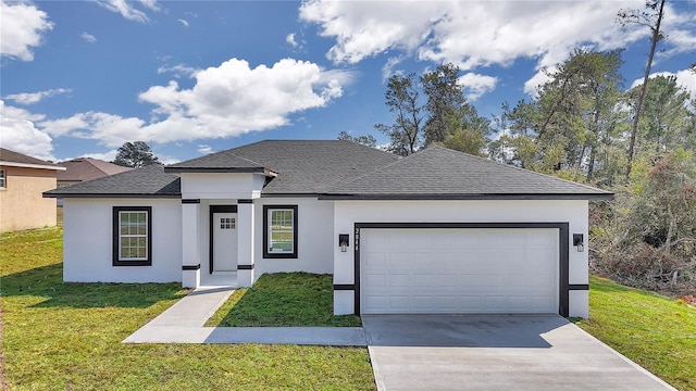 view of front of house featuring a garage and a front yard