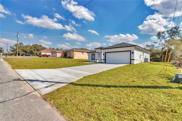 2844 SW 162nd Street Rd, Ocala, FL 34473 - single story home featuring a garage, central AC, and a front lawn