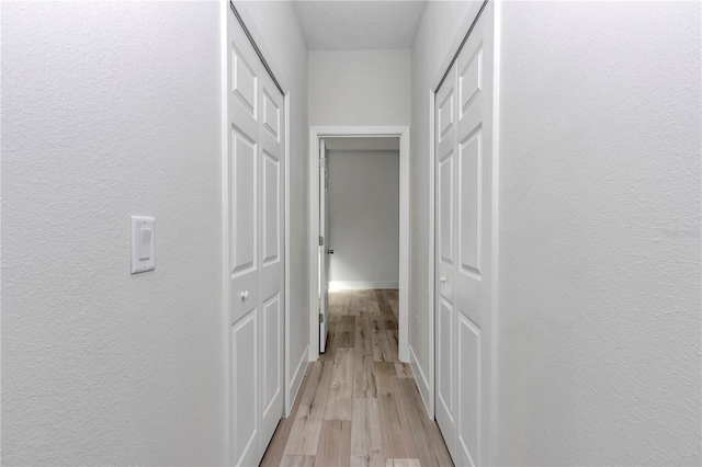 2844 SW 162nd Street Rd, Ocala, FL 34473 - corridor featuring light hardwood / wood-style floors