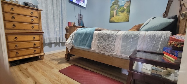 bedroom featuring light hardwood / wood-style floors