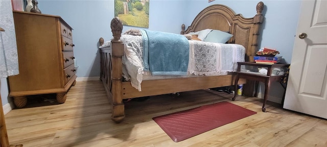 bedroom featuring hardwood / wood-style floors