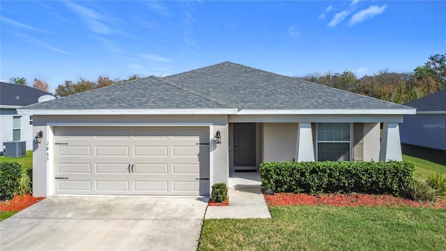 ranch-style home featuring stucco siding, central AC unit, driveway, and a shingled roof