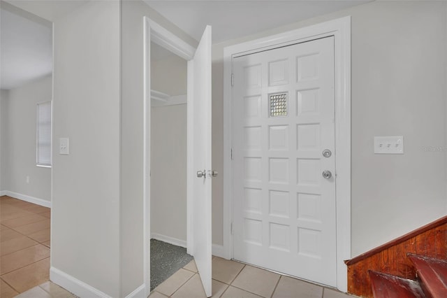 view of tiled foyer entrance