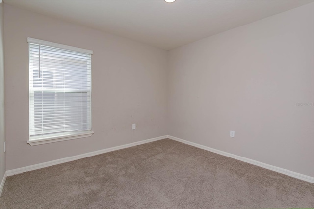 view of carpeted spare room