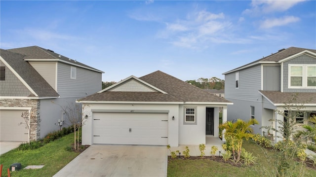 view of front facade with a garage and a front lawn