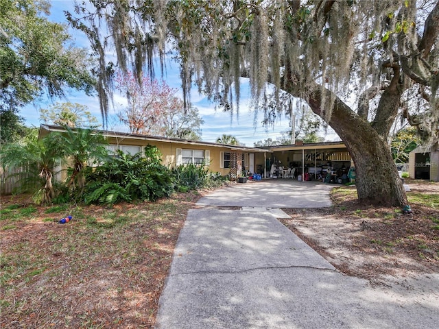 view of front of property with a carport