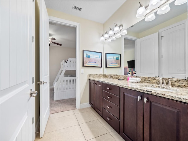 bathroom with vanity, tile patterned floors, and ceiling fan