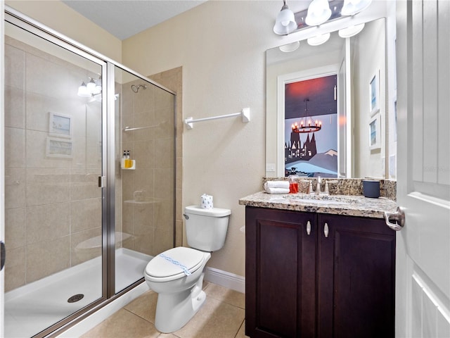 bathroom with walk in shower, tile patterned floors, toilet, vanity, and a notable chandelier