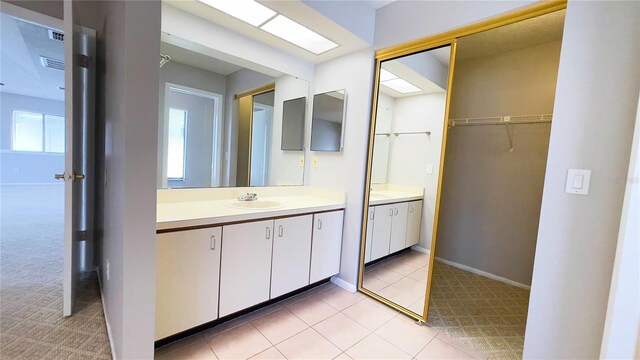 4448 Pinebark Ave Unit 56-1, Orlando, FL 32811 - full bath with vanity, a spacious closet, and baseboards