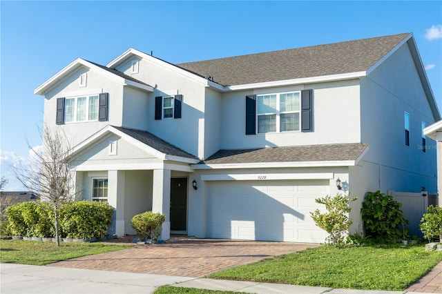 front of property with a garage