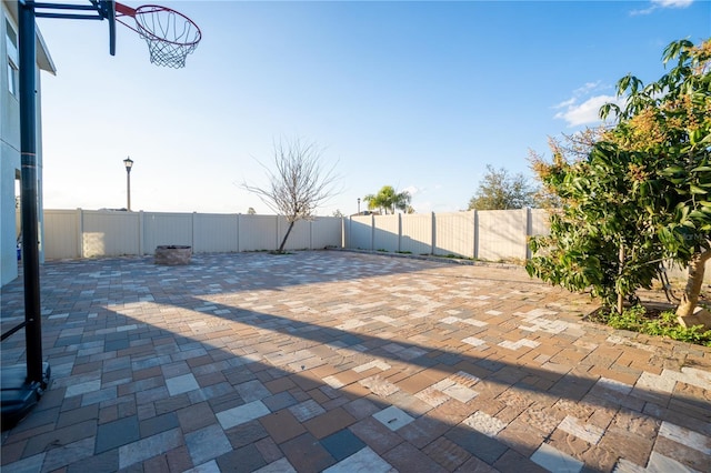 view of patio / terrace with basketball court