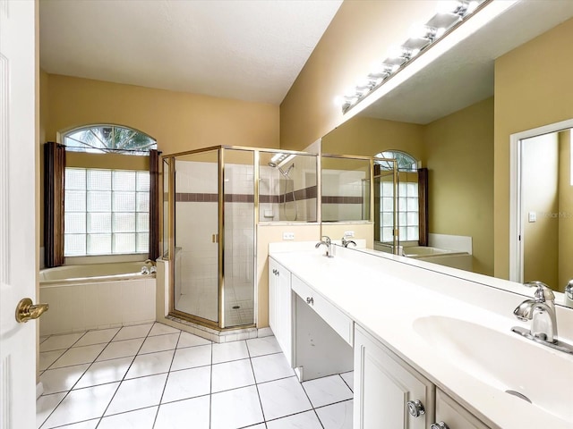 bathroom featuring vanity, separate shower and tub, and tile patterned floors