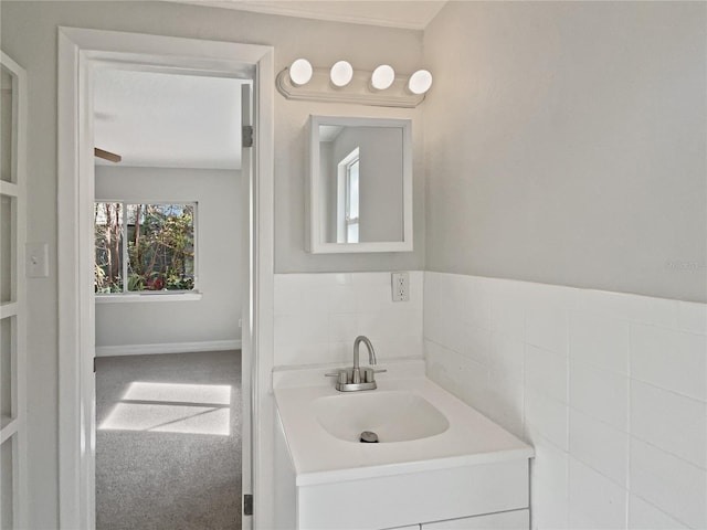 662 Lake Dr, Altamonte Springs, FL 32701 - bathroom featuring vanity and tile walls
