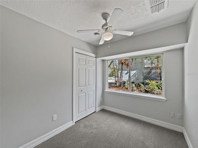 662 Lake Dr, Altamonte Springs, FL 32701 - unfurnished bedroom with baseboards, a closet, visible vents, and carpet flooring