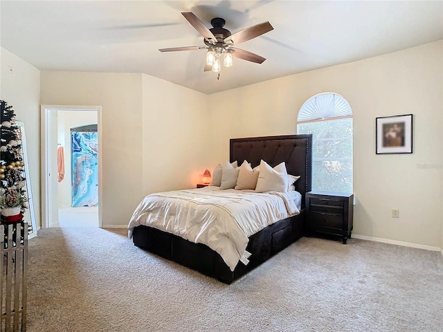 bedroom with ceiling fan and light colored carpet