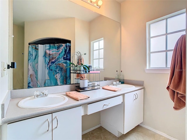 bathroom featuring vanity and a shower with curtain