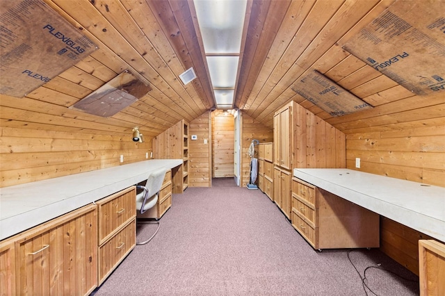 interior space featuring wooden ceiling, wooden walls, and vaulted ceiling