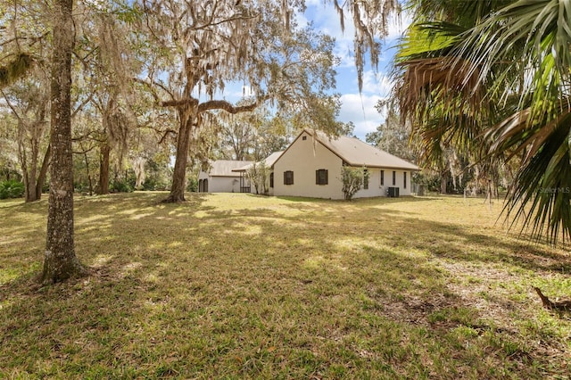 view of yard featuring central AC
