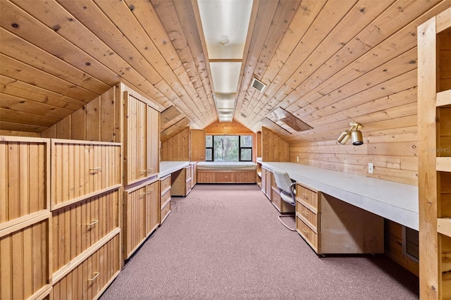 additional living space featuring wood ceiling, visible vents, dark carpet, and built in desk