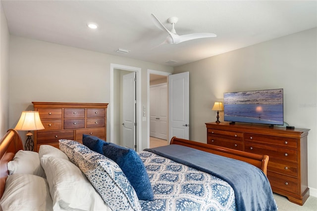 bedroom with recessed lighting, light carpet, and ceiling fan