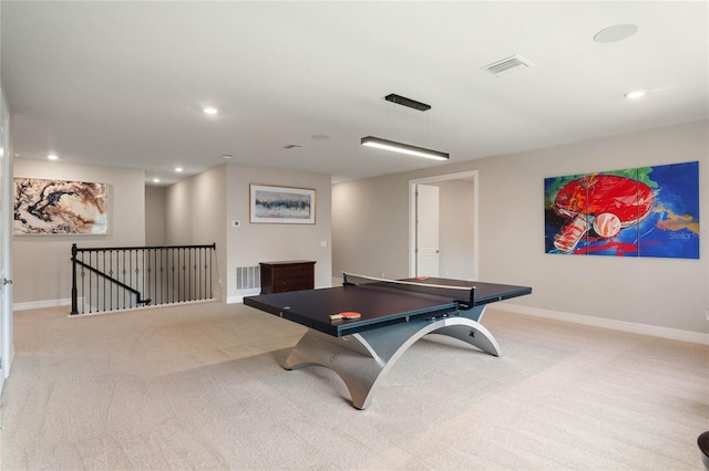 recreation room featuring baseboards, recessed lighting, light colored carpet, and visible vents