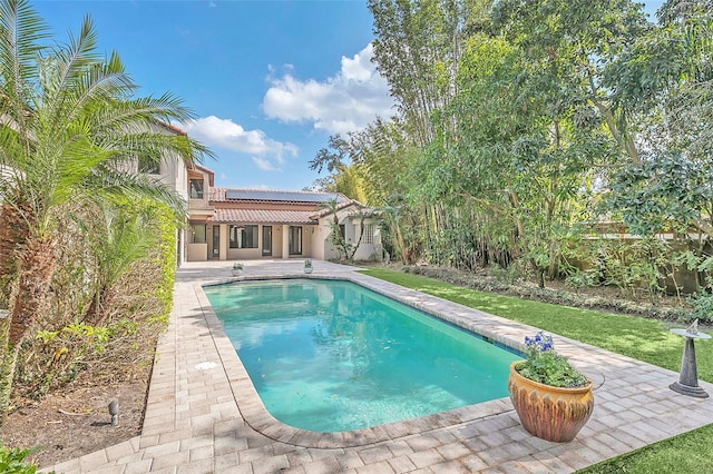 outdoor pool featuring a patio area