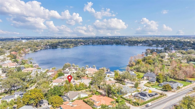 birds eye view of property featuring a water view and a residential view