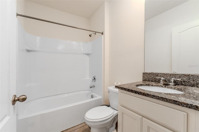 full bathroom with vanity, shower / washtub combination, and toilet