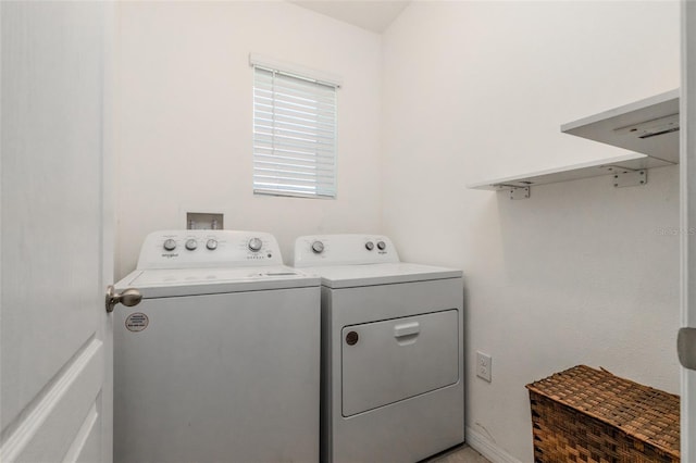 laundry area with separate washer and dryer